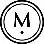 A bold letter "M" with a dot below it, enclosed in two concentric black circles on a white background.